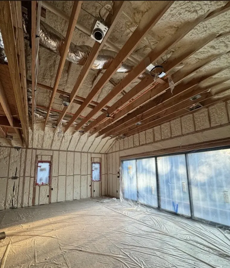 Interior walls and ceiling insulated with spray foam during new construction in Defiance